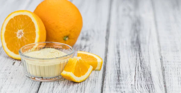 Portion apelsin frukt pulver (selektiv fokusering) — Stockfoto