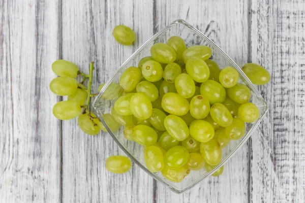 Some fresh White Grapes on wooden background (selective focus; c — Stock Photo, Image