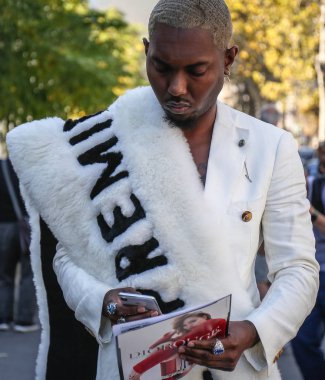 PARIS, France- September 26 2018: Men on the street during the Paris Fashion Week. clipart