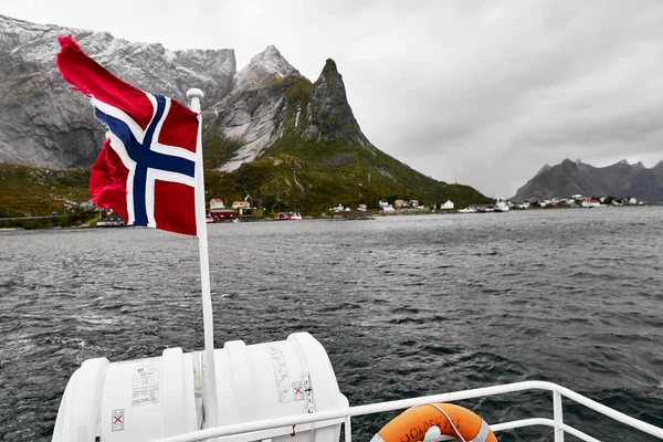 Norwegian Flag Wind Boat Deck While Driving Ocean Mountains Village — Stock Photo, Image