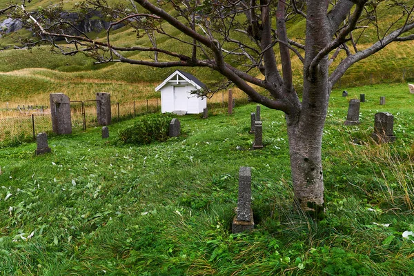 Beautiful old graveyard at the village Vinstad on Lofoten Islands in Norway.