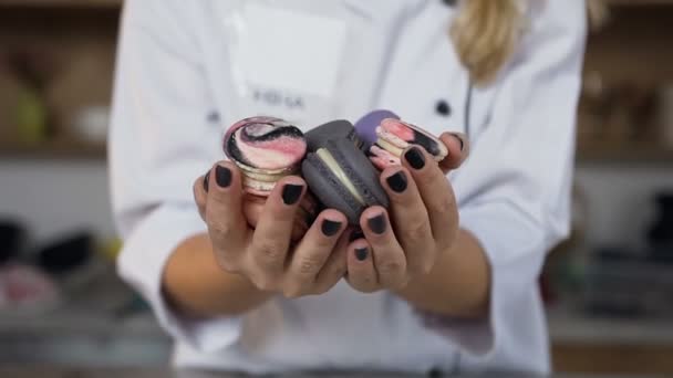 Close Shot Colorful Macaroons Female Hands Stretching Camera Kitchen Background — Stock Video