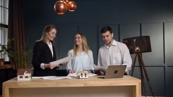 Portrait of three young architect during work day in the office. — Stock Video