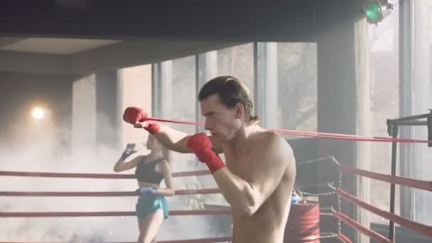 Male boxer training in the boxing club. — Stock Video