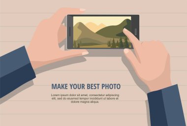 Mobil fotoğraf kavramı. Telefon için man doğa manzara fotoğrafını arıyorum. Ahşap arka plan üzerinde izole.