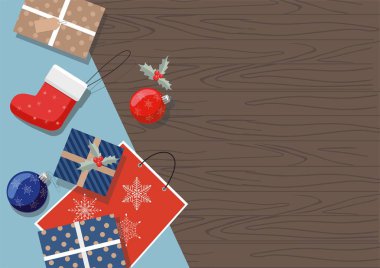 Noel hediyeleri, toplar ve çorap bir tablo. Üstten görünüm.