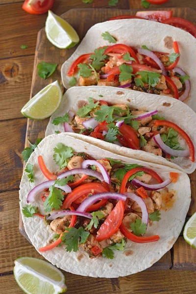 Mexican tacos on a brown background