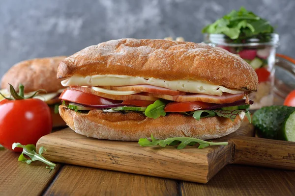 Ciabatta sandwich with arugula — Stock Photo, Image