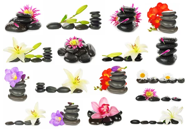 Surtido de piedras de masaje con flores — Foto de Stock