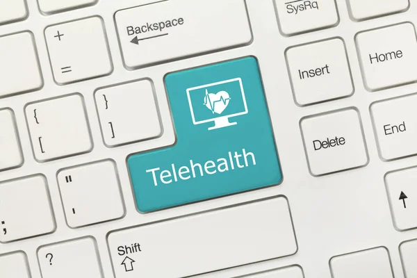 Tastiera concettuale bianca - Telehealth (tasto blu ) — Foto Stock