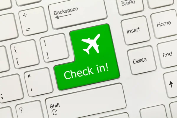 Biały pojęciowy klawiatury - zameldowania (zielony przycisk z samolotu sy — Zdjęcie stockowe
