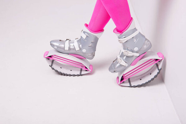 close-up in kangoo jumps boots indoors unrecognizable rear view