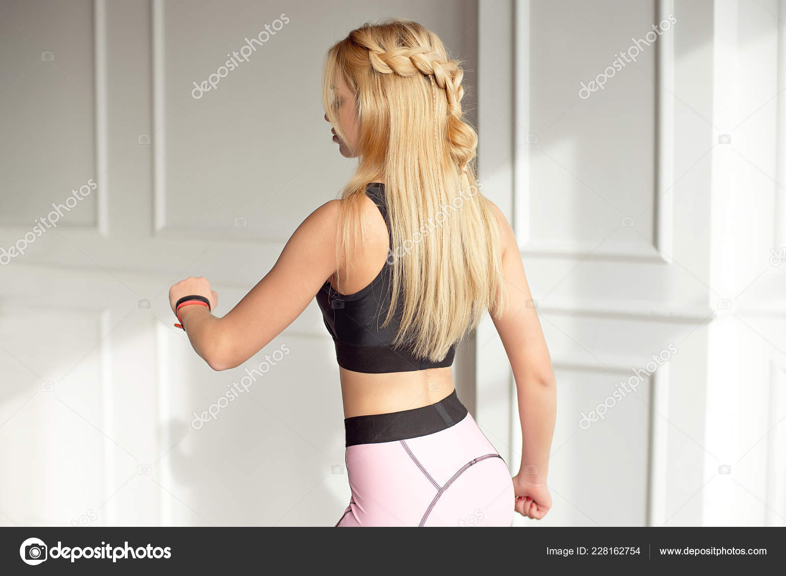 Young Slim Woman Athletic Body Long Blonde Hair Dressed Black Stock Photo  by ©VBStudio 228162754
