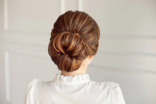 Rear View Female Hairstyle Middle Bun Brown Hair Stock Photo by ©VBStudio  253974468