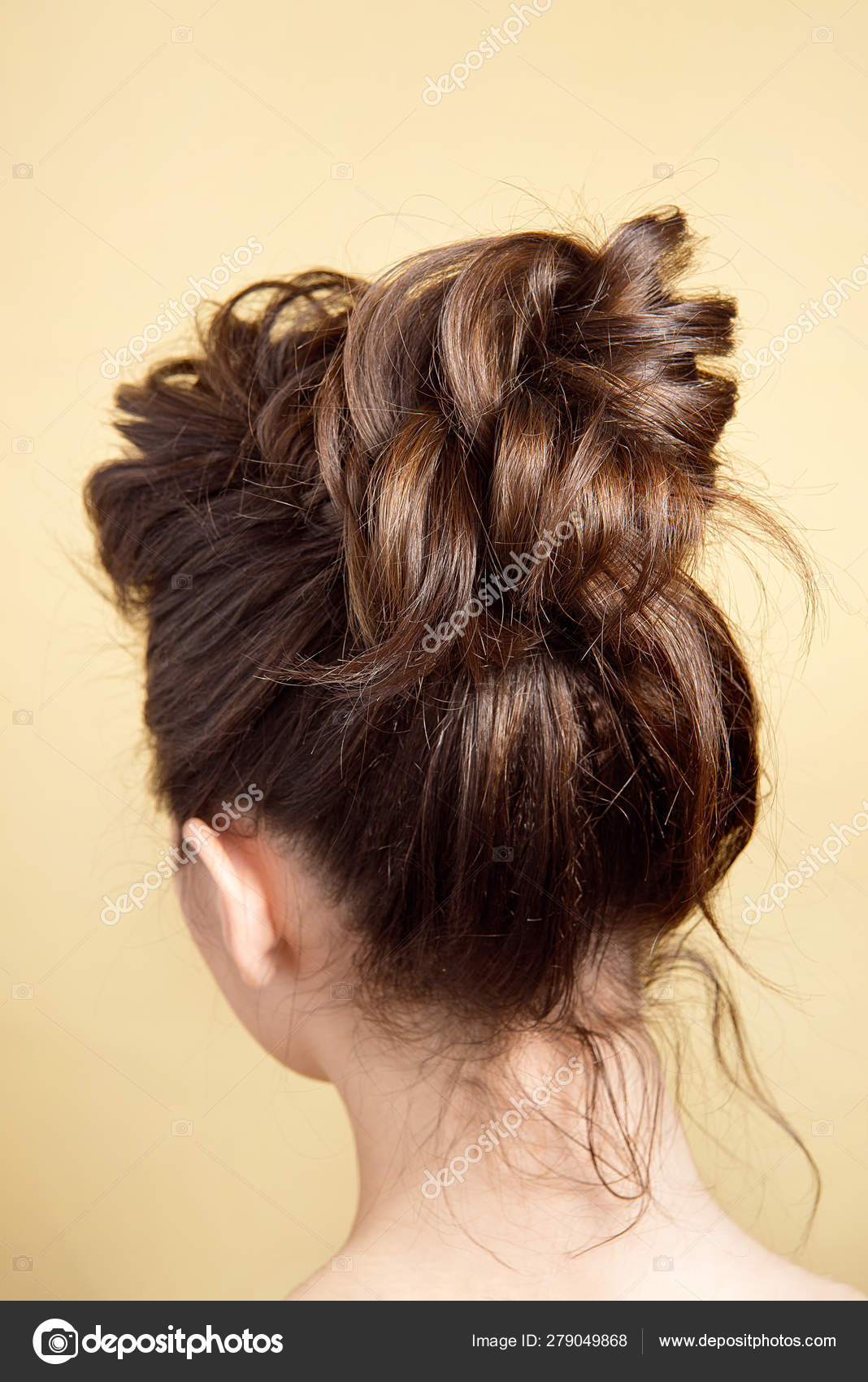 Messy hair bun Stock Photos, Royalty Free Messy hair bun Images |  Depositphotos