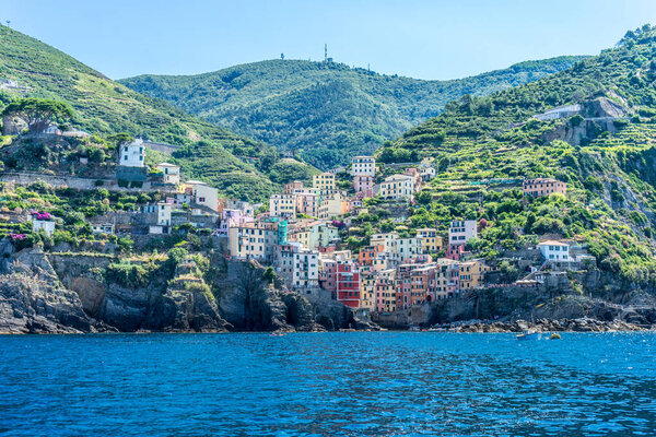 The cityscape of Riomaggiore viewed from the sea, Cinque Terre, Italy, Riviera