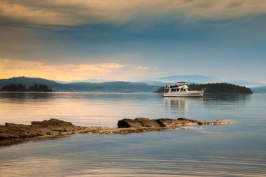 Sunset at Montague Harbour Marine Provincial Park on Galiano Island in the Gulf Islands, British Columbia clipart
