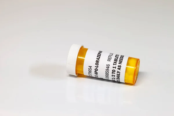 Prescription bottle with Lorezapam on a white background. Lorezapam is a generic prescription anti-anxiety medication.
