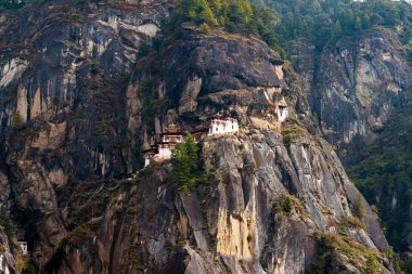 Paro Taktsang: The Tiger's Nest Monastery - Bhutan. Taktsang is the popular name of Taktsang Palphug Monastery, located in the cliffside of Paro valley, in Bhutan. clipart
