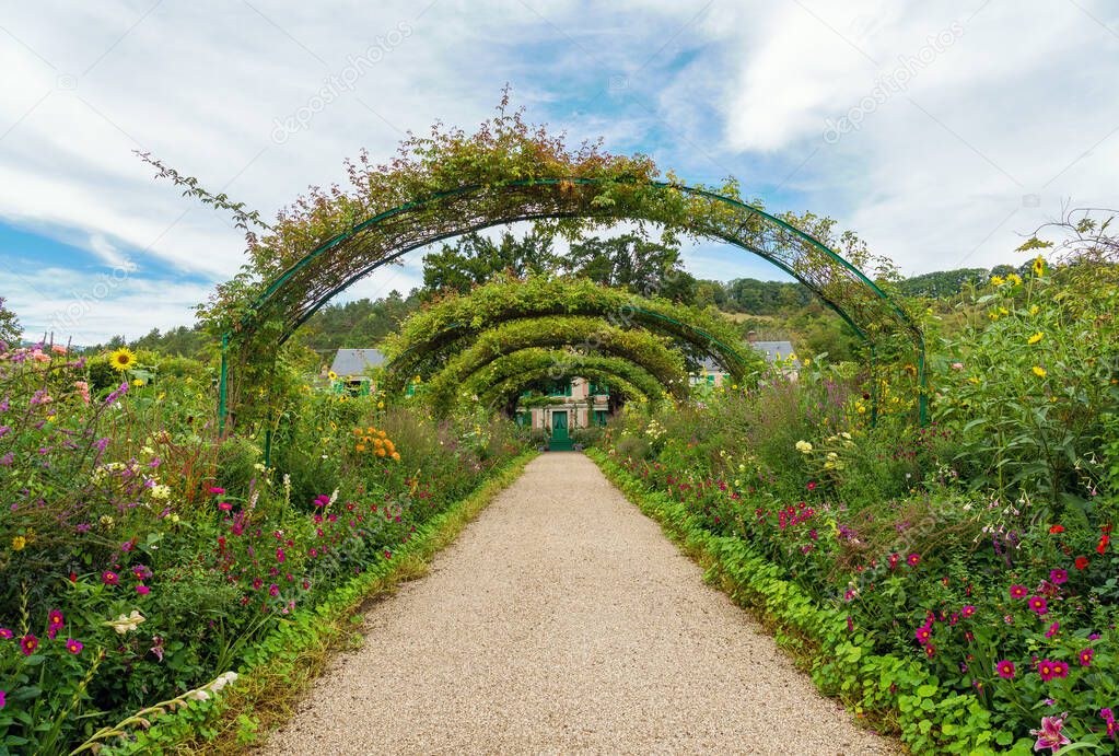 Monet's home and flowers pathway at Giverny in summer - Giverny, France