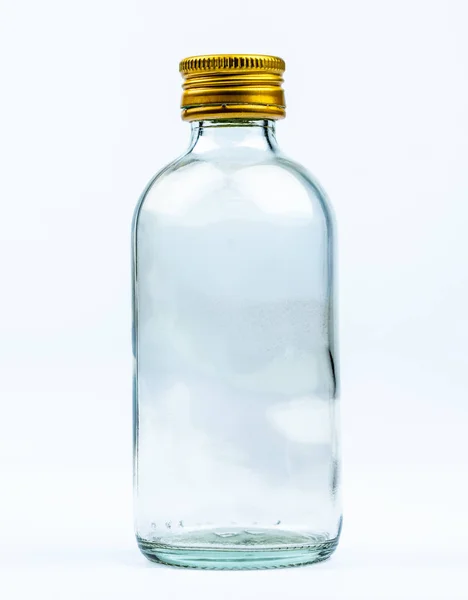 Botella Vidrio Redonda Transparente Vacía Con Tapa Amarilla Aluminio Cerrada — Foto de Stock