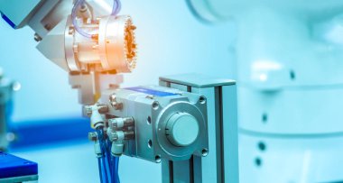 Robot el makine üzerinde simüle nesne sürükleyici arka plan bulanık. İmalat Sanayi akıllı robot kullanın. Fabrika bir robot araç. Robot mühendislik. Robot sürükleyici sistemleri. Robot tutma.