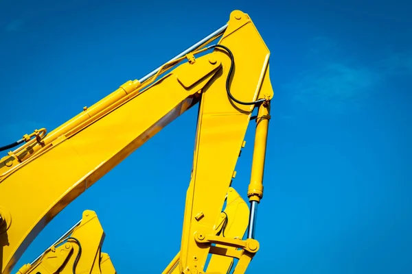 Yellow Backhoe Hydraulic Piston Arm Clear Blue Sky Heavy Machine — Stock Photo, Image