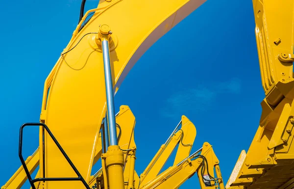 Sarı Beko Hidrolik Piston Kolu Karşı Ile Mavi Gökyüzü Temizleyin Telifsiz Stok Imajlar