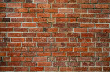 Turuncu tuğla duvar doku arka plan. Metin için arka plan. Dış mimari konsepti. Kirli turuncu tuğla duvar arka plan. İnşaat için arka plan.  