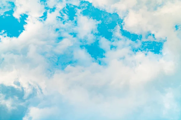 Beautiful blue sky and white cumulus clouds abstract background. Cloudscape background. Blue sky and white clouds on sunny day. Nature weather. Bright day sky for happy day background.
