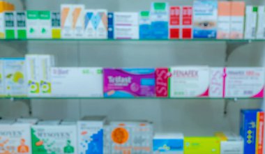 Blurred picture of medicine shelf in drug store. Pharmacy shop interiors. Pharmaceutical products in drugstore. Medical retail shop. Pharmacy in hospital. Healthcare business. Drug display shelf. clipart