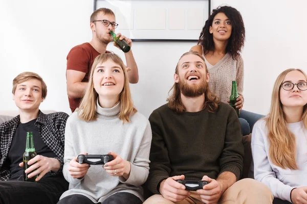 Close Photo Cheerful Friends Sitting Sofa Spending Time Together While — Stock Photo, Image