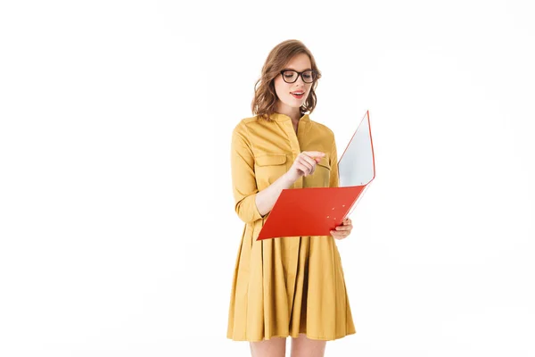 Portrait Pretty Thoughtful Lady Eyeglasses Yellow Dress Standing Red Folder — Stock Photo, Image