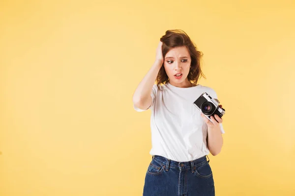 Portrait Young Lady Standing Little Retro Camera Hands Perplexedly Looking — Stock Photo, Image