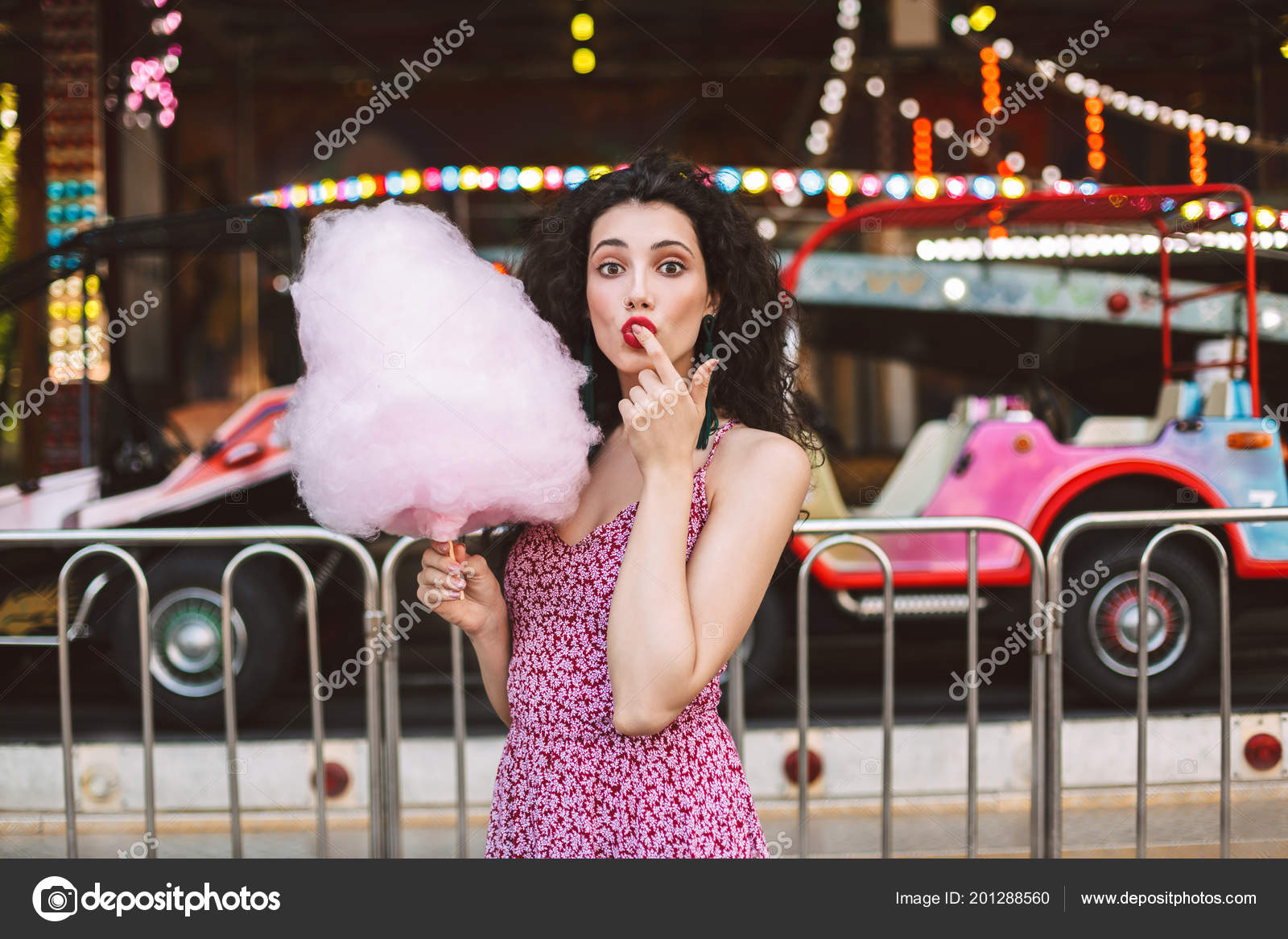 Beautiful Girl Dark Curly Hair Dress Standing Pink Cotton Candy Stock Photo  by ©Garetsworkshop 201288560