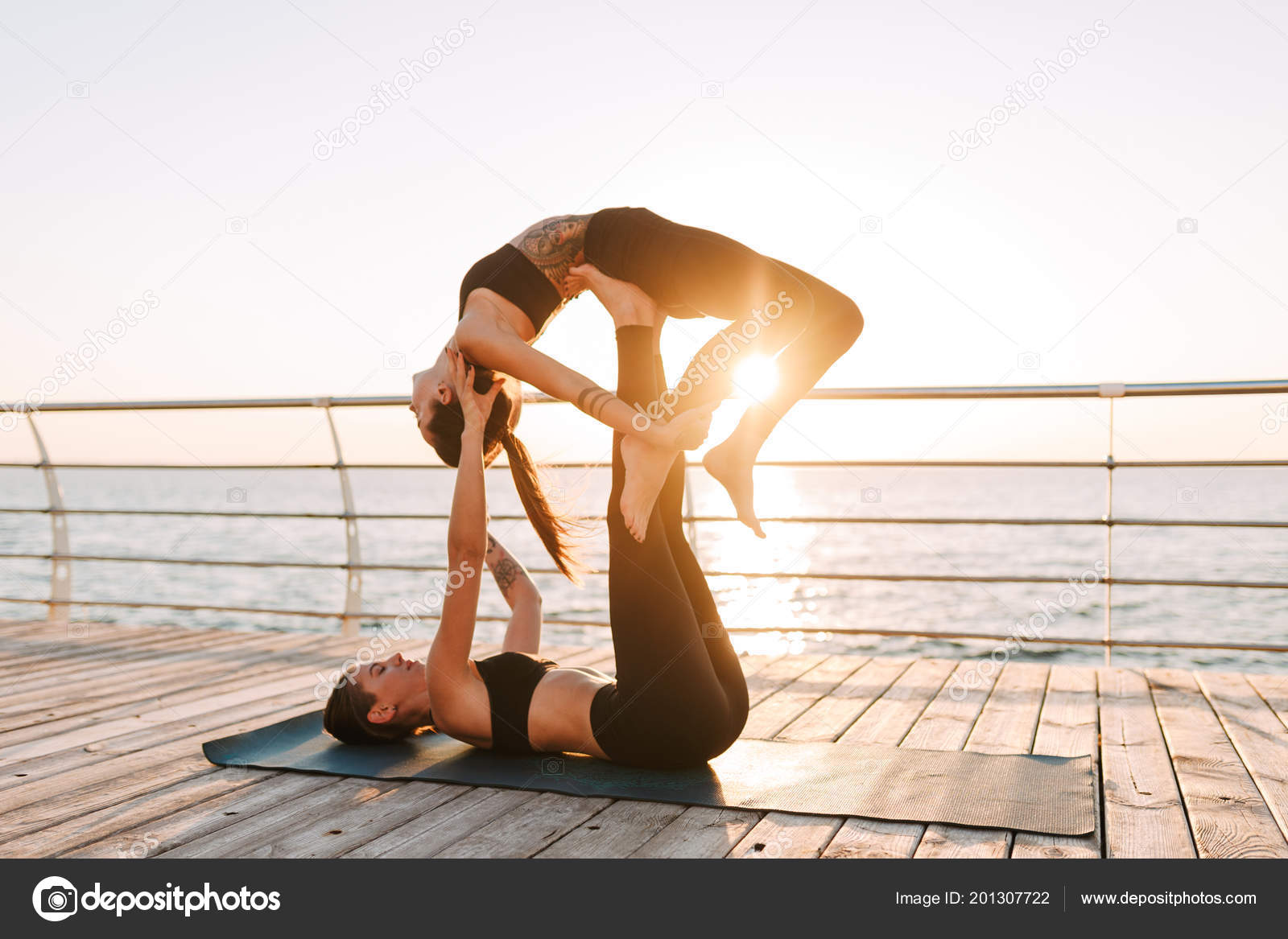 Photo Two Ladies Black Sporty Tops Leggings Training Yoga Poses