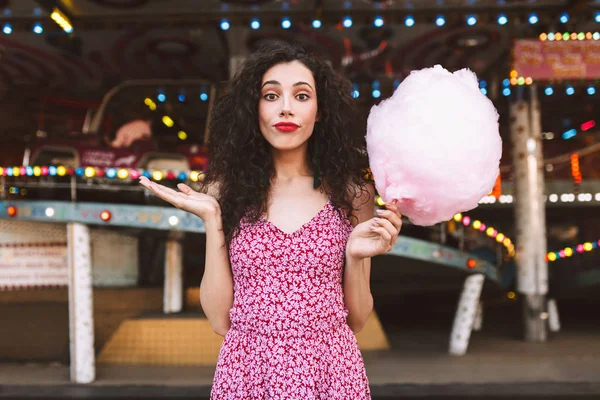 Young Woman Dark Curly Hair Dress Standing Cotton Candy Hand — Stock Photo, Image