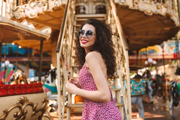 Beautiful Smiling Woman Dark Curly Hair Sunglasses Dress Standing Lolly — Stock Photo, Image