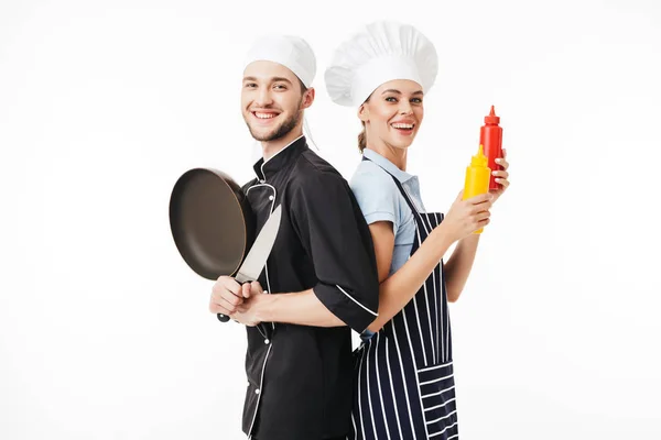 Hombre Joven Chef Uniforme Negro Con Cuchillo Sartén Mujer Cocinero — Foto de Stock