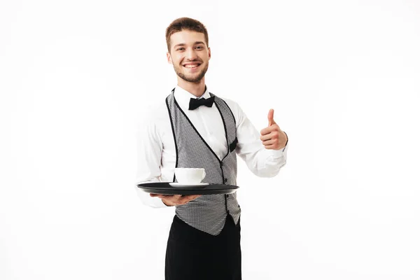 Young Smiling Waiter Uniform Holding Tray Cup Coffee Hand Joyfully — Stock Photo, Image