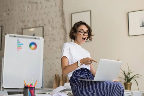 Pretty Emotional Girl Short Curly Hair Eyeglasses White Shirt Sitting — Stock Photo, Image