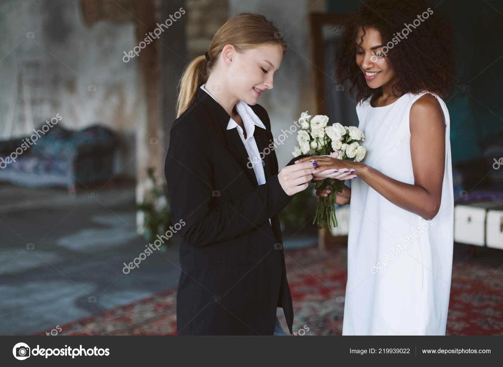 Young Pretty Woman Blond Hair Black Suit Putting Wedding Ring