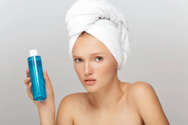 Portrait Young Upset Woman Makeup White Towel Head Holding Blue — Stock Photo, Image