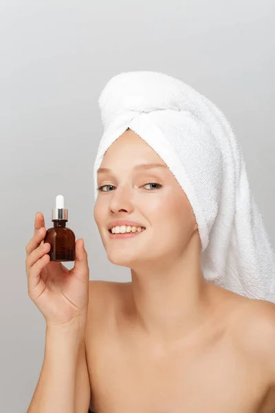 Portrait Attractive Lady Makeup White Towel Head Holding Liquid Bottle — Stock Photo, Image