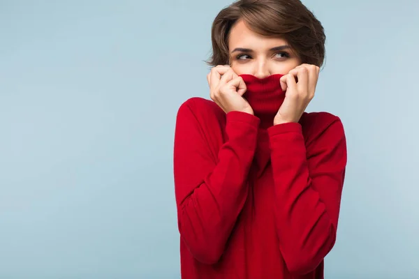 Young Thoughtful Woman Dark Short Hair Hiding Face Red Sweater — Stock Photo, Image