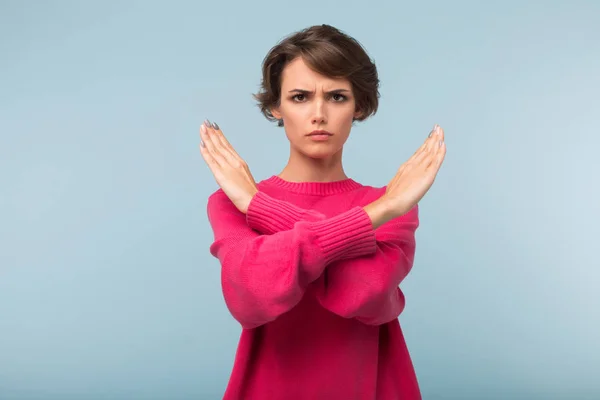 Young Grumpy Woman Dark Short Hair Pink Sweater Showing Stop — Stock Photo, Image