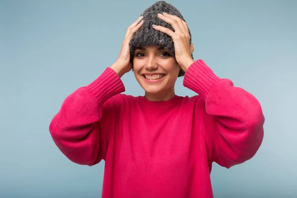 Young Cheerful Woman Pink Sweater Gray Knitted Hat Joyfully Looking — Stock Photo, Image