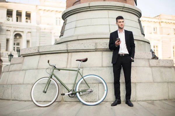 Young Businessman Classic Black Suit White Shirt Wireless Earphones Holding — Stock Photo, Image