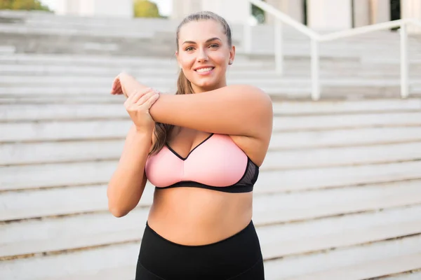 Young Pretty Smiling Size Woman Pink Sporty Top Leggings Stretching — Stock Photo, Image