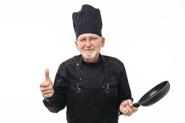 검은 앞치마 및 ca에 회색 수염과 오래 된 매력적인 웃는 남자 — 스톡 사진